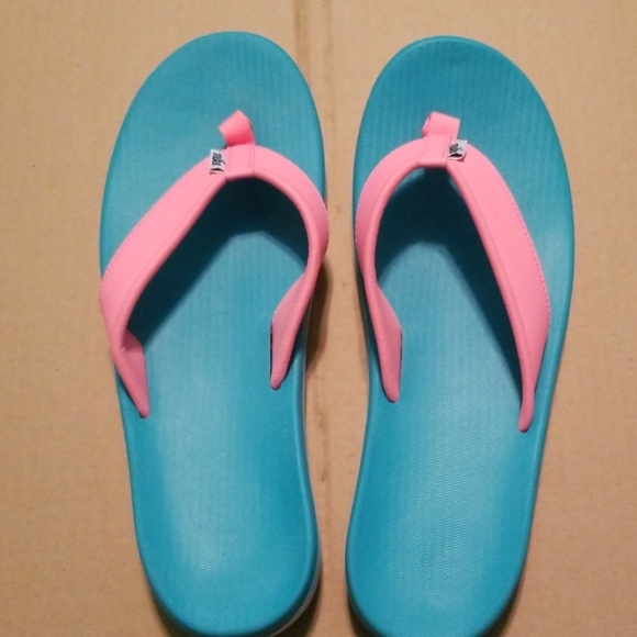 nike turquoise flip flops